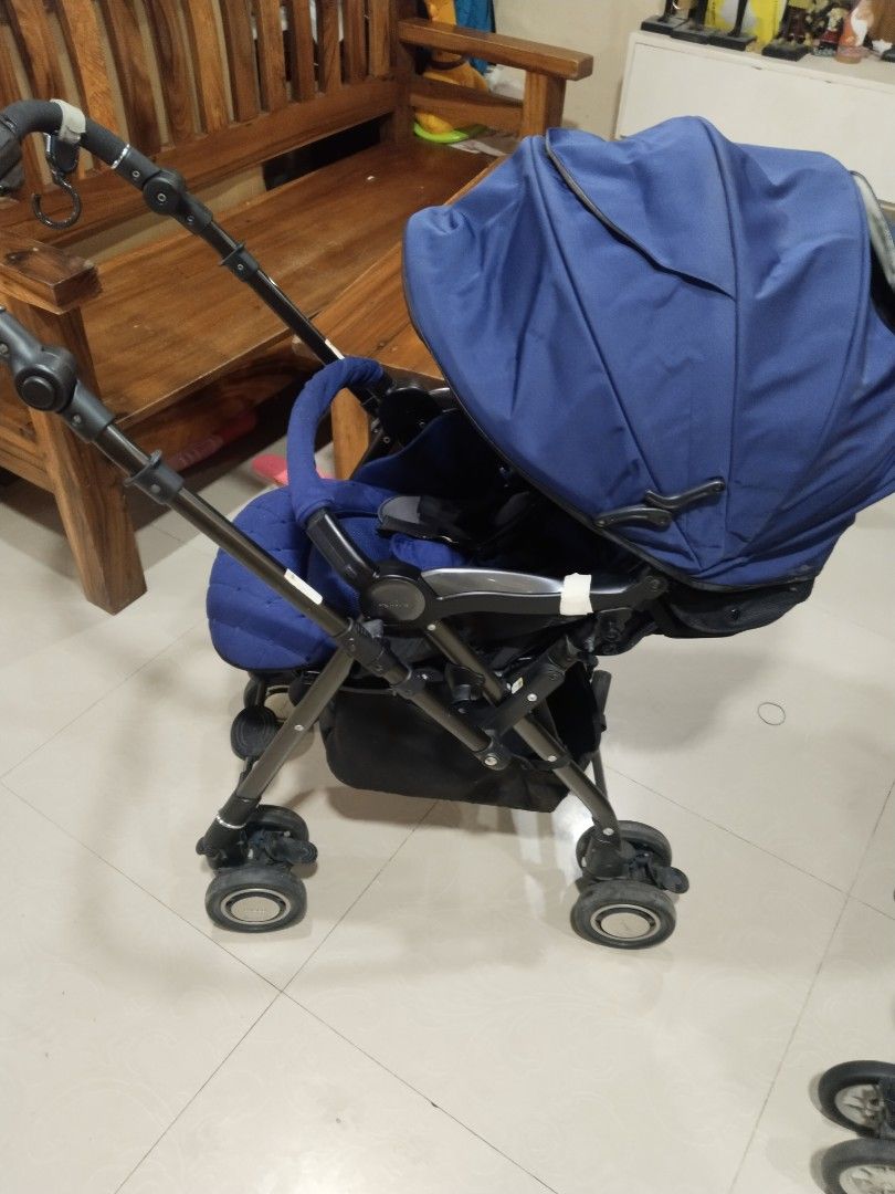 Aprica soraria Stroller - Navy Blue (Category: Strollers) located in Cavite. Submitted by dimple082 (Listing ID 1463553654, Image 3). Description: - Combi stroller in stylish navy blue - Lightweight and super easy to maneuver - Excellent canopy for sun protection - Convenient storage basket underneath - Folds compactly for easy transport - Ideal for everyday outings with your baby.