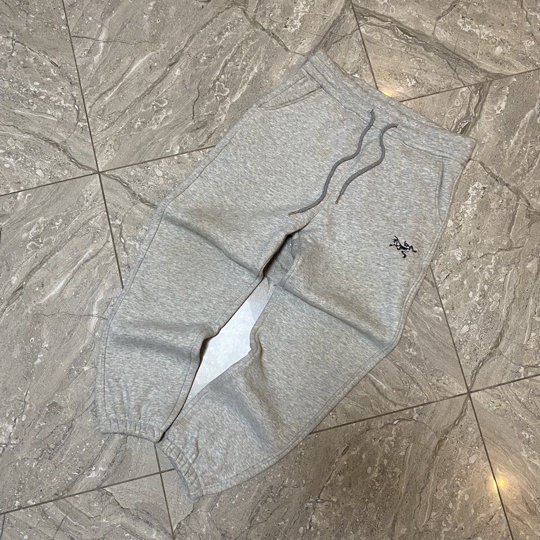 Arc'teryx Grey Logo Sweatpants Size M (Category: Joggers) located in Manila. Submitted by _vnnnsss (Listing ID 1463488387, Image 1). Description: - Brand: Arc'teryx - Color: Grey - Size: Medium - Features: Brand logo on left leg, elastic waistband with drawstring, ribbed cuffs - Style: Comfortable, casual - Ideal for: Lounging, everyday wear.