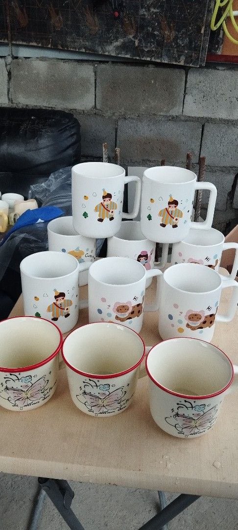 Assorted Ceramic Mugs - Cute Designs PASALO (Category: Coffee & Tea Tableware) located in Manila. Submitted by reilly.bee (Listing ID 1463426839, Image 2). Description: - Assorted ceramic mugs featuring Kitty, bear, and cartoon characters. - Unique handle designs including stars and rings. - Ideal for enjoying coffee, tea, or hot chocolate. - Makes a wonderful gift or a treat for yourself. - Special bundle deal available for multiple purchases..