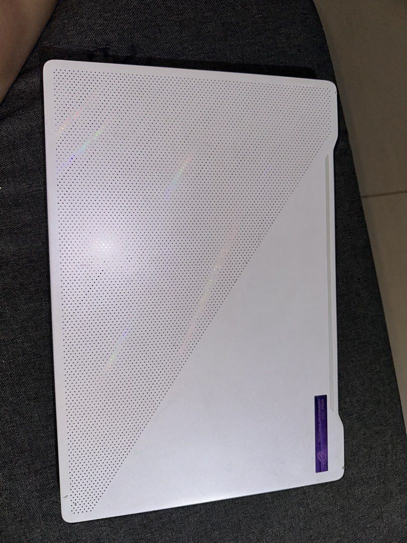 ASUS ROG Zephyrus G14 GA401QM Laptop (Category: Laptops & Notebooks) located in Quezon City. Submitted by apujooz (Listing ID 1463433663, Image 3). Description: - ASUS ROG Zephyrus G14 Laptop - Processor: AMD Ryzen 9 5900HS - Graphics: NVIDIA GeForce RTX 3060 - RAM: 16GB - Storage: 954GB - Operating System: Windows 11 Home - Condition: Good working condition - Note: Anime stickers on the lid.
