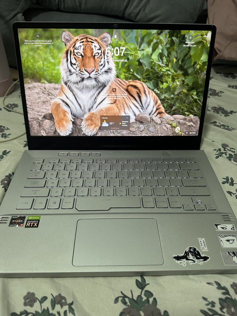 ASUS ROG Zephyrus G14 GA401QM Laptop (Category: Laptops & Notebooks) located in Quezon City. Submitted by apujooz (Listing ID 1463433663, Image 2). Description: - ASUS ROG Zephyrus G14 Laptop - Processor: AMD Ryzen 9 5900HS - Graphics: NVIDIA GeForce RTX 3060 - RAM: 16GB - Storage: 954GB - Operating System: Windows 11 Home - Condition: Good working condition - Note: Anime stickers on the lid.