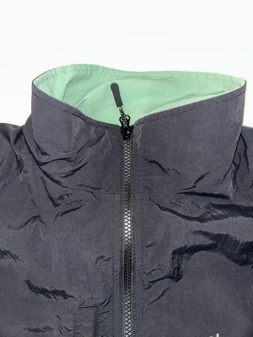 Atmosphere Black Reversible Jacket (Category: Coats, Jackets and Outerwear) located in Manila. Submitted by hyacinth1414 (Listing ID 1463467385, Image 2). Description: - Black jacket from Atmosphere - Reversible design with a light green lining - Features a zip-up front closure - Includes convenient pockets - Elasticated cuffs and hem for a snug fit - Ideal for layering or as a light outerwear option.