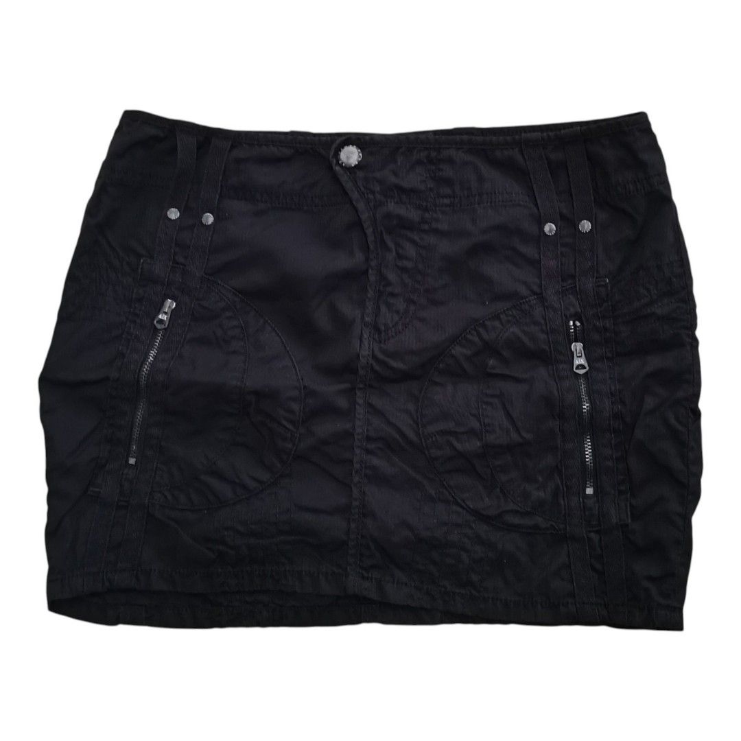Authentic A|X Armani Exchange Black Cargo Utility Mini Skirt (Category: Skirts) located in Santa Cruz. Submitted by oddpenguin-4575 (Listing ID 1463497124, Image 1). Description: 📌measurement:Laid flat (×2 the measurement) Waist-15"/Hips-17.5"/Lenght-14"/Hem-17" 📌size:Why it says Size 2 on the tag: This skirt is a low-rise design. It is meant to sit lower down on your hip bones rather than up at your narrow natural waist. Because it sits lower,