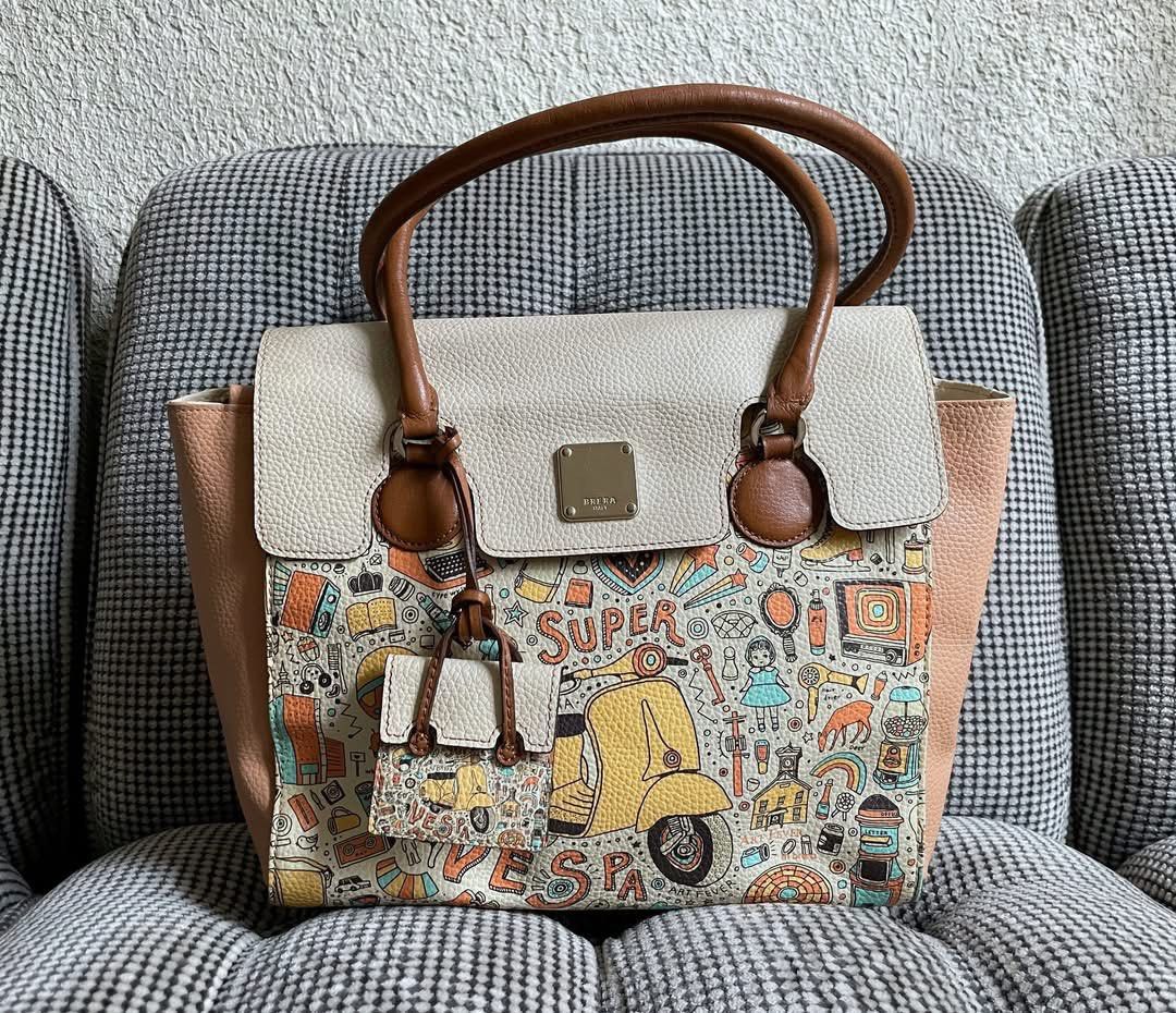Authentic Brera Art Fever Italy bag (Category: Shoulder Bags) located in Bulacan. Submitted by thriftbagcollections (Listing ID 1463442020, Image 1). Description: Authentic Brera Art Fever Italy bag, Good condition! Approx:H-10”W-13.5”D-5.3” handle 8.5” signs of usage .