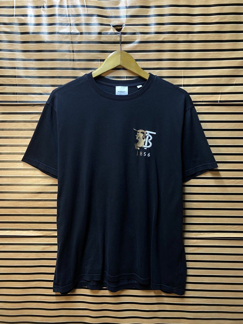 AUTHENTIC BURBERRY LONDON TEE (Category: Tshirts & Polo Shirts ) located in Makati City. Submitted by drip.poww (Listing ID 1462950925, Image 1). Description: - Authentic Burberry - Color: Black - Size: Large - Dimes: 23x27 - Authentic - Excellent condition - Need wash, fresh from bale - Material: 100% Cotton Please don’t expect too much—these are thrifted (ukay) items. 😊 !!STILL NEGOTIABLE!!.
