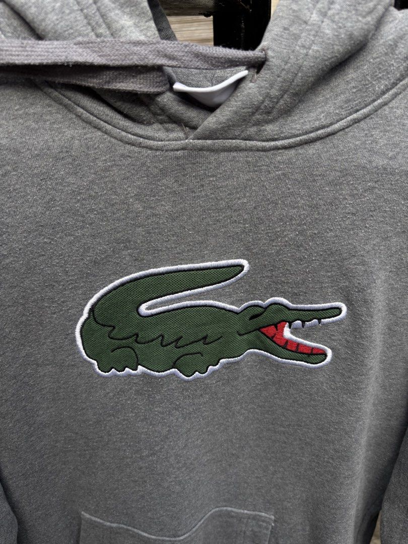 AUTHENTIC LACOSTE BIG LOGO HOODIE🩶 (Category: Coats, Jackets and Outerwear) located in Maasin. Submitted by chevyferna66833 (Listing ID 1463459669, Image 2). Description: L@COSTE BIG LOGO HOODIE🩶 SIZE 2 ON TAG S-M FITTING EXCELLENT CONDITION MINE 1580.