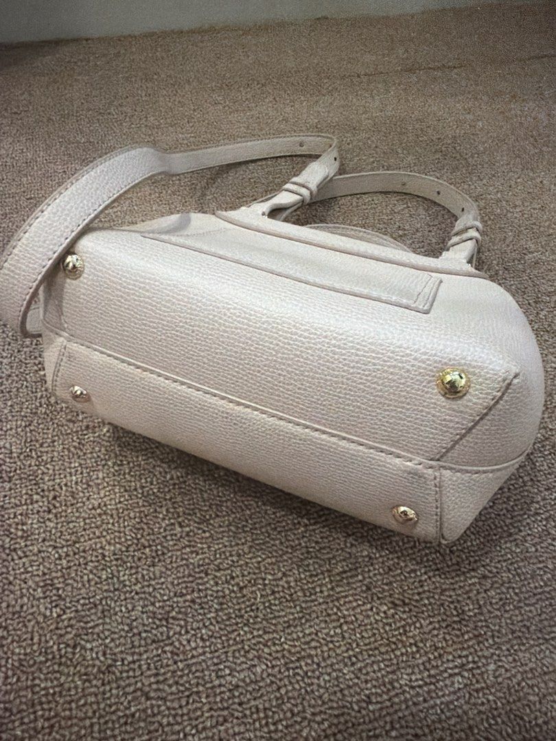 Authentic Polene Numero Un - Beige Leather Crossbody (Category: Luxury Bags & Wallets) located in Quezon City. Submitted by purpleblush (Listing ID 1463345253, Image 3). Description: - Polene handbag in light beige - Textured leather material - Top handle and detachable crossbody strap - Multiple interior compartments - Elegant gold hardware details - Clean inside and out - Ideal for everyday use.