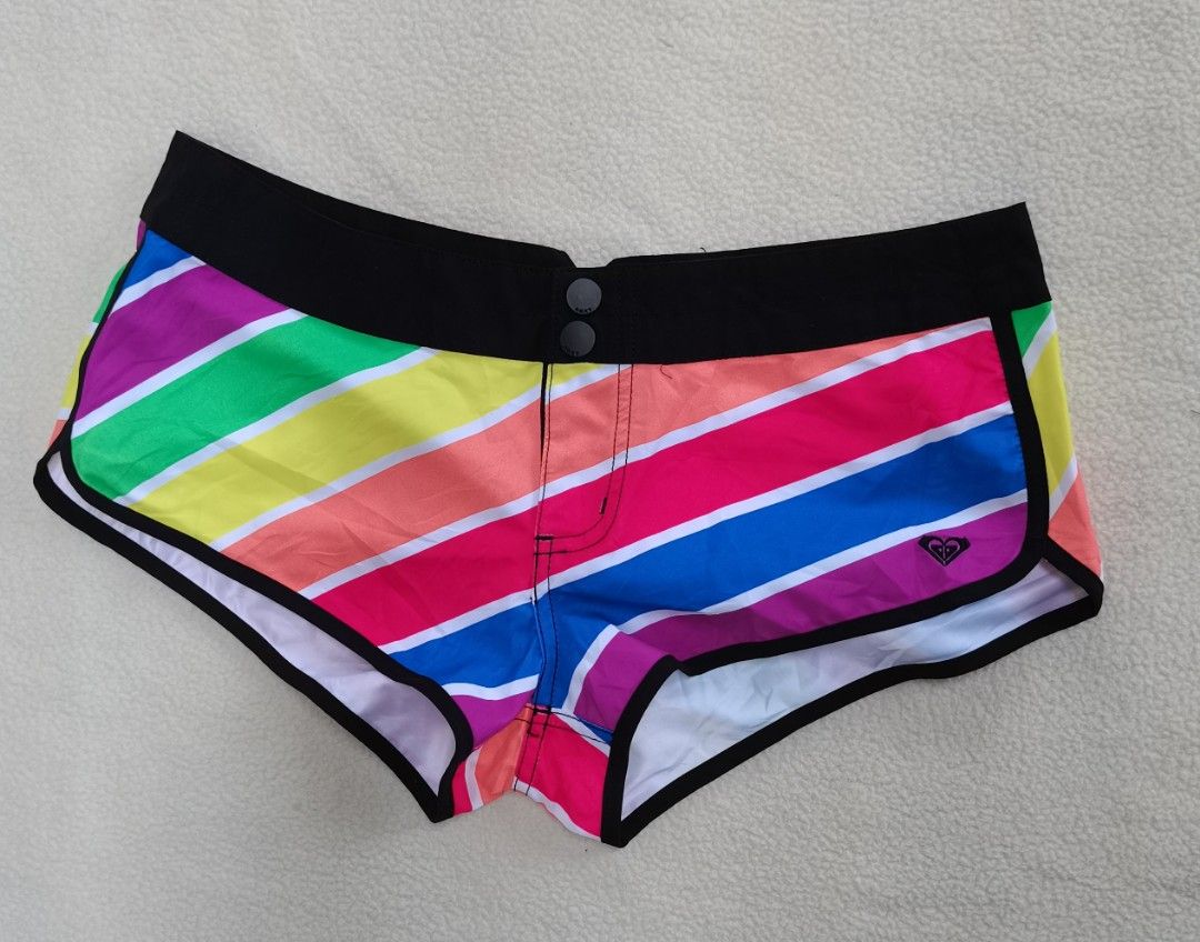 Authentic Roxy Rainbow Striped Boardshorts Swim Shorts (Category: Shorts) located in Santa Cruz. Submitted by oddpenguin-4575 (Listing ID 1463499141, Image 2). Description: 📌measurement:Laid flat Waist-16"/Rise-8"/Leg opening-12"/Hips-18.5" 📌size:AU 10 / US 6 (Fits like a local Women's Medium) 📌Brand:Roxy 📌color-10/10 📌-vibrant pair of Roxy boardshorts perfect for beach days, surfing, swimming, or casual summer wear. Features a striking colo