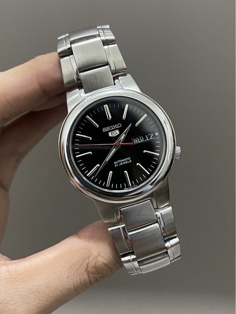 Authentic Seiko 5 SNKA07 Black Dial (Category: Luxury Watches) located in Bacolod City. Submitted by _passed.on (Listing ID 1463392613, Image 1). Description: : Authentic Seiko 5 SNKA07 Black Dial Details: Ref. - 7S26-02N0 Case Size - 37mm Automatic Movement Day/Date Function Newly Serviced/Overhauled Newly Polished/Buffed Dial and Hands Mint Condition Case and Strap Mint Condition Long Links Excellent Condition, Super Clean Overall Free Hard Tra