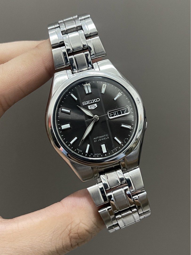 Authentic Seiko 5 SNKG35 Grey/Black Sunburst Dial (Category: Luxury Watches) located in Bacolod City. Submitted by _passed.on (Listing ID 1463392171, Image 1). Description: : Authentic Seiko 5 SNKG35 Grey/Black Sunburst Dial Details: Ref. - 7S26-03E0 Case Size - 37mm Automatic Movement Day/Date Function Newly Serviced/Overhauled Newly Polished/Buffed Dial and Hands Mint Condition Case and Strap Mint Condition Rotor is Replaced, But Working and Ru
