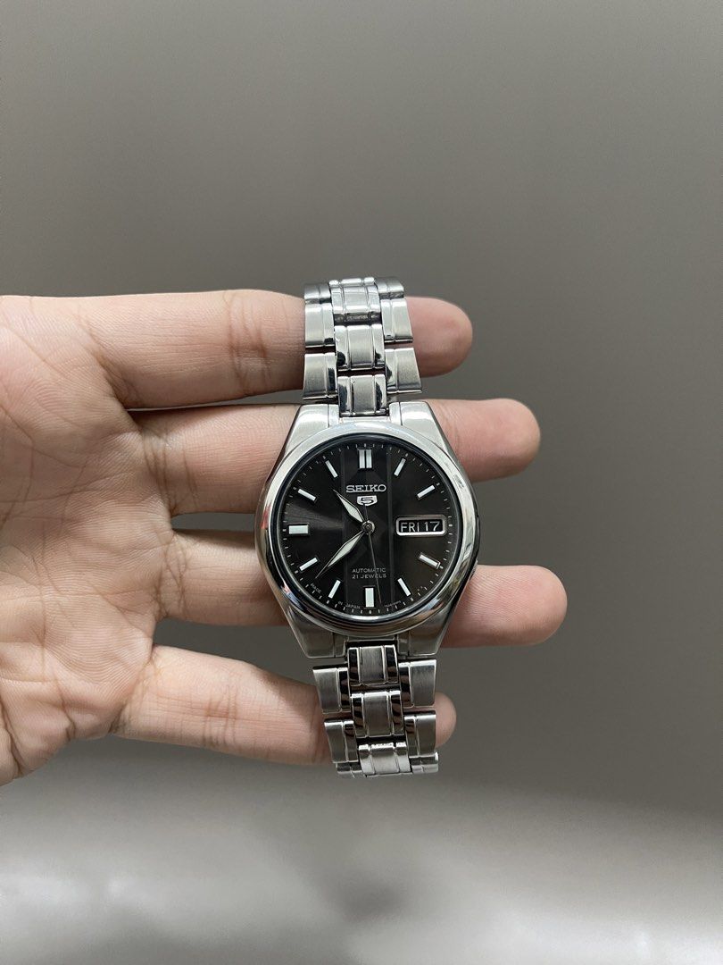 Authentic Seiko 5 SNKG35 Grey/Black Sunburst Dial (Category: Luxury Watches) located in Bacolod City. Submitted by _passed.on (Listing ID 1463392171, Image 2). Description: : Authentic Seiko 5 SNKG35 Grey/Black Sunburst Dial Details: Ref. - 7S26-03E0 Case Size - 37mm Automatic Movement Day/Date Function Newly Serviced/Overhauled Newly Polished/Buffed Dial and Hands Mint Condition Case and Strap Mint Condition Rotor is Replaced, But Working and Ru