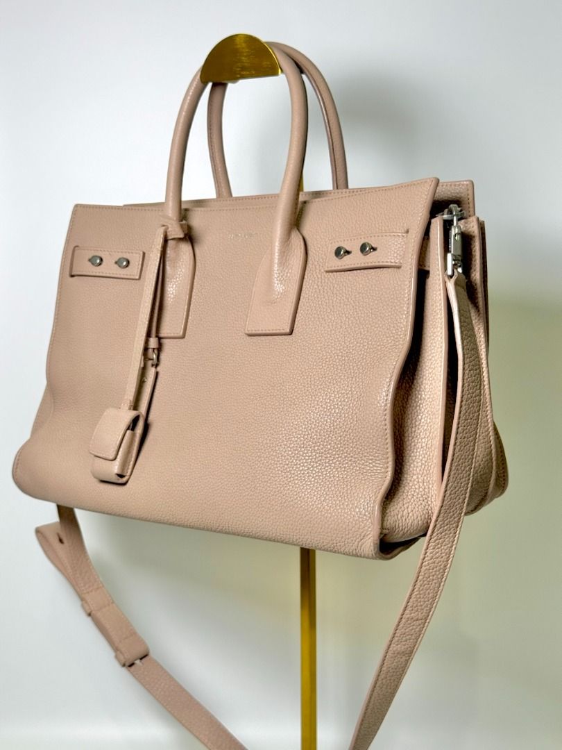 [AUTHENTIC] YSL Sac de Jour - Cream (Category: Luxury Bags & Wallets) located in Caloocan City. Submitted by luxegenieph (Listing ID 1463480476, Image 3). Description: For office girlies who want to put all their essentials in one bag. It gives girl-boss vibes. Ranking: AB Inclusions: Authenticity card, Certificate of Authenticity Assessment: Slight discoloration, signs of use 🏷️ ₱22,500 - Luxe Genie PH is not affiliated with any brands posted o