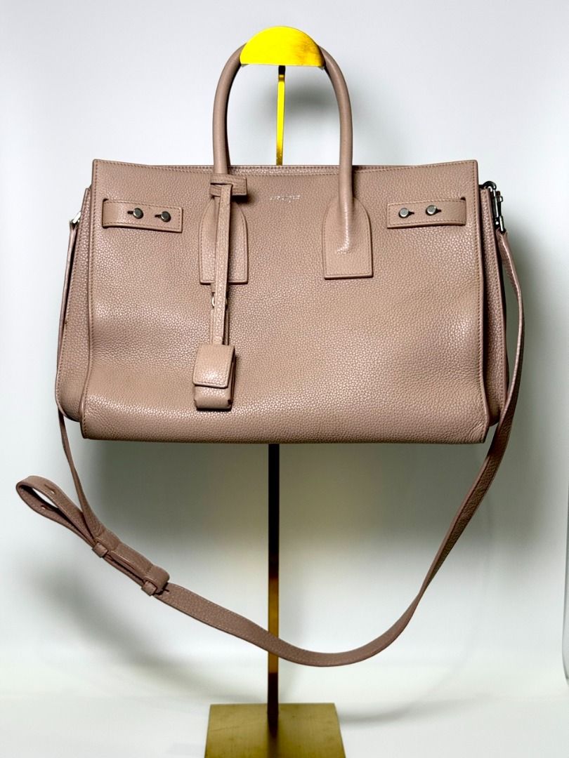 [AUTHENTIC] YSL Sac de Jour - Cream (Category: Luxury Bags & Wallets) located in Caloocan City. Submitted by luxegenieph (Listing ID 1463480476, Image 1). Description: For office girlies who want to put all their essentials in one bag. It gives girl-boss vibes. Ranking: AB Inclusions: Authenticity card, Certificate of Authenticity Assessment: Slight discoloration, signs of use 🏷️ ₱22,500 - Luxe Genie PH is not affiliated with any brands posted o