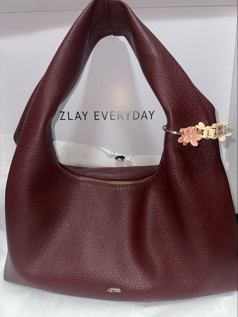 Aztrid Hobo Bag (Category: Shoulder Bags) located in Mandaluyong City. Submitted by prelovedmorawako (Listing ID 1463553075, Image 1). Description: 📌Helping a friend. ✅ used but not abused ✅ Medium size ✅ Redox color ✅ dust bag and box included.