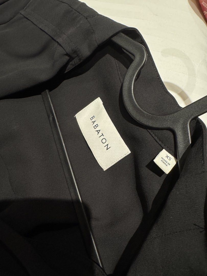 ARITZIA Babaton Black Draped Open Front Belted Jacket XS (Category: Coats, Jackets and Outerwear) located in Manila. Submitted by twister4 (Listing ID 1463501993, Image 3). Description: - Brand: ARITZIA Babaton - Style: Black draped jacket - Features: Open front, tie belt at back, long sleeves with layered detail - Material: 100% polyester - Origin: Made in China - Perfect for: Layering over outfits.