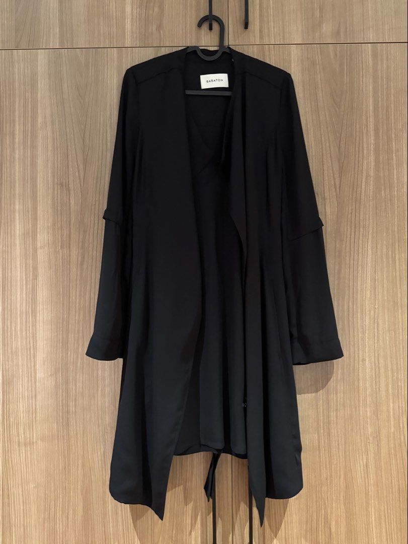ARITZIA Babaton Black Draped Open Front Belted Jacket XS (Category: Coats, Jackets and Outerwear) located in Manila. Submitted by twister4 (Listing ID 1463501993, Image 1). Description: - Brand: ARITZIA Babaton - Style: Black draped jacket - Features: Open front, tie belt at back, long sleeves with layered detail - Material: 100% polyester - Origin: Made in China - Perfect for: Layering over outfits.
