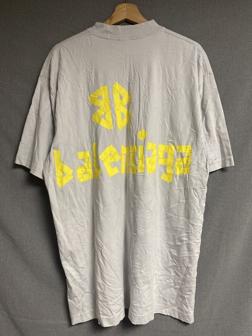 Balenciga Distressed Shirt (Category: Tshirts & Polo Shirts ) located in Cabuyao City. Submitted by ukaythriftshirt (Listing ID 1463397084, Image 2). Description: Balenciaga Distressed Shirt Excellent Condition Xlarge 23 Dimes 31.5 Color rate 9/10 Cut tags No hard issue need hard wash only - 450.