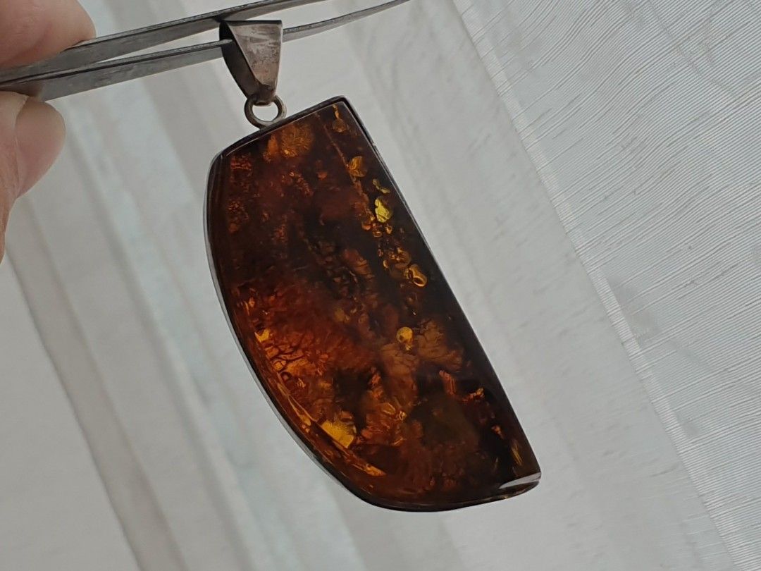 Baltic Amber Sterling Silver Pendant (Category: Necklaces) located in Quezon City. Submitted by WasalakTwo (Listing ID 1463390658, Image 2). Description: Vintage from Japan Authentic Goodcondition Large and chunky Open for delivery nationwide.