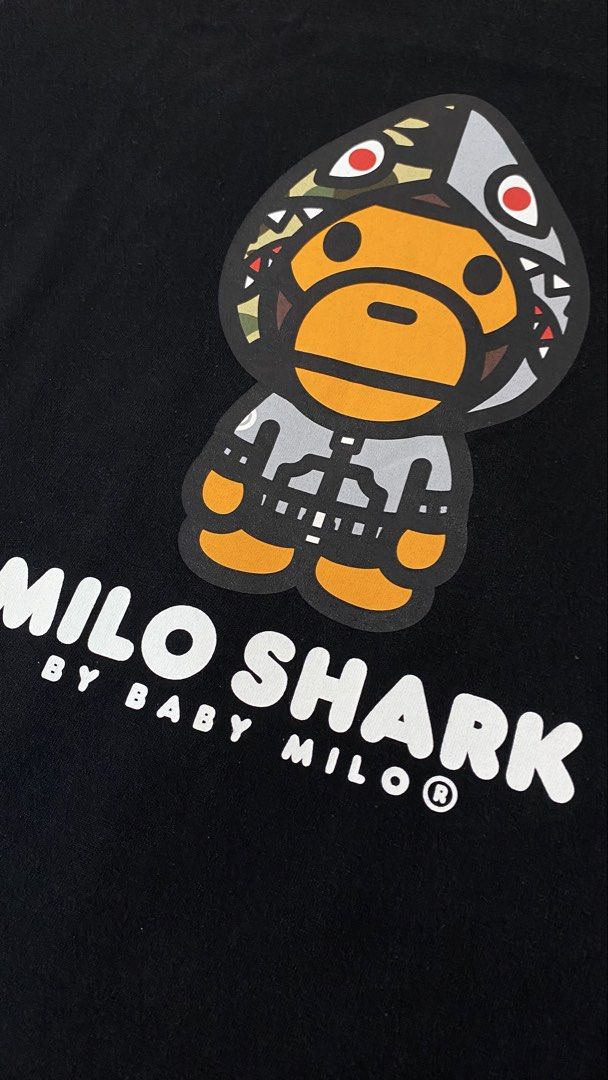 Bape Milo Shark Tee (Category: Tshirts & Polo Shirts ) located in Quezon. Submitted by bapestaa (Listing ID 1463483804, Image 2). Description: (Details) • Bape Milo Shark Tee • Size: XL on tag • Dimes: 21.5x28 • Color Rate: 9.3+ • Issue/s: No issue Quezon Province, 4301..