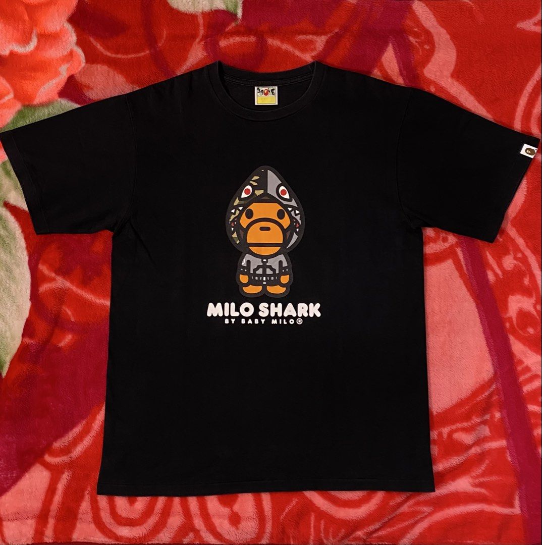 Bape Milo Shark Tee (Category: Tshirts & Polo Shirts ) located in Quezon. Submitted by bapestaa (Listing ID 1463483804, Image 1). Description: (Details) • Bape Milo Shark Tee • Size: XL on tag • Dimes: 21.5x28 • Color Rate: 9.3+ • Issue/s: No issue Quezon Province, 4301..
