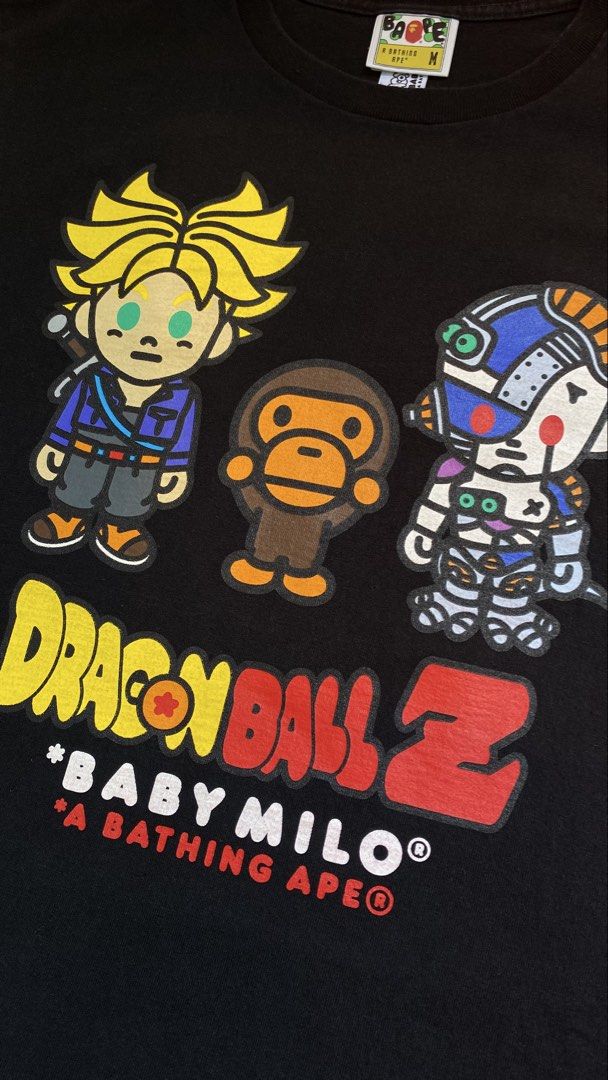 Bape x DBZ (Trunks & Mecha Frieza) (Category: Tshirts & Polo Shirts ) located in Quezon. Submitted by bapestaa (Listing ID 1463467886, Image 2). Description: (Details) • Bape x DBZ (Trunks & Mecha Frieza) • Size: Medium on tag • Dimes: 20.5x26.5 • Color Rate: 9.3 or better • Issue/s: None Quezon Province, 4301..