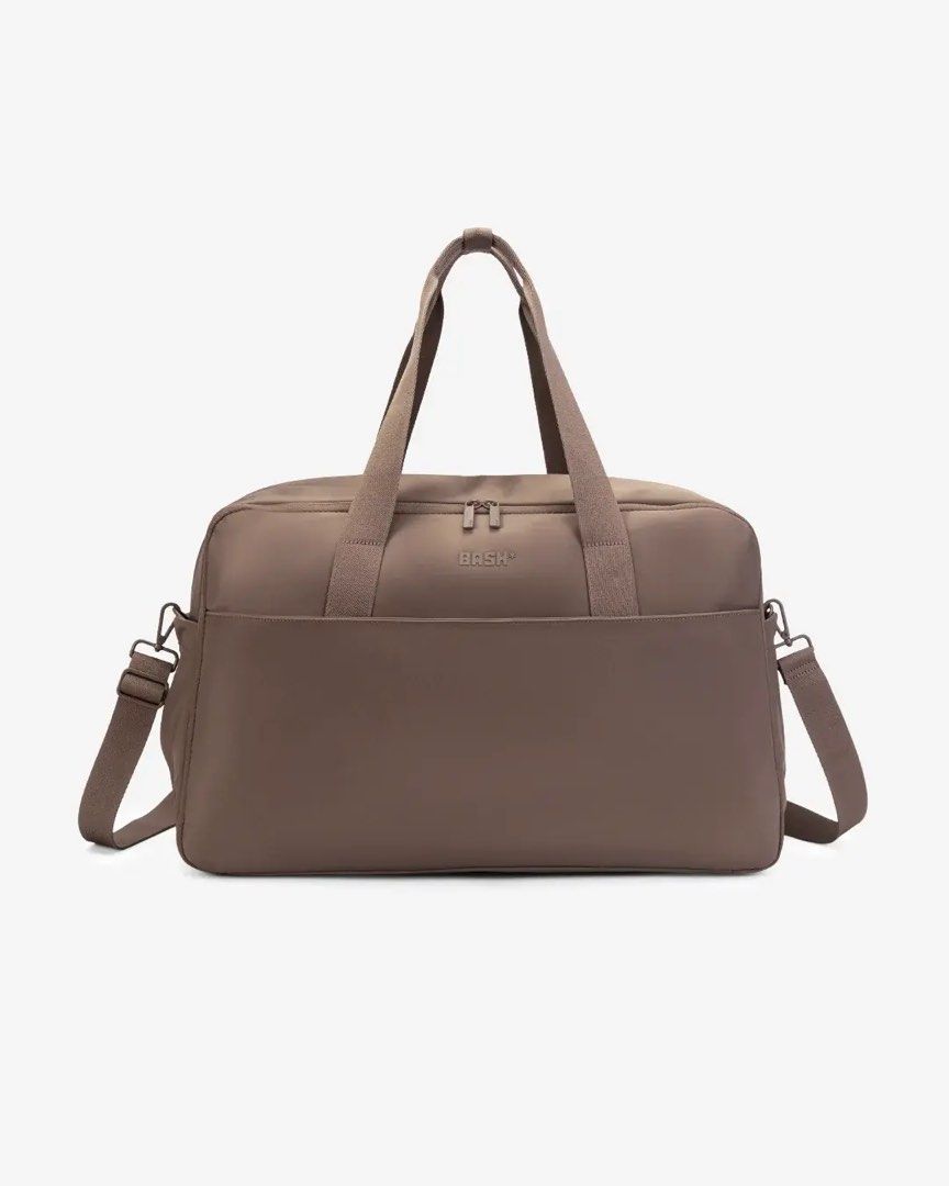BASH* | Mini Weekender Mono in Oak Duffle Picklebag (Category: Diaper Bags & Wetbags) located in Quezon City. Submitted by avenue.de.belle (Listing ID 1463446478, Image 1). Description: BASH* | Mini Weekender Mono in Oak •Duffle Bag • Weekender Bag • Picklebag • Brand New • with free pouch DESCRIPTION Your go-to Mini Weekender, refined. Now fully tonal inside and out, with breathable cotton straps and a hidden top zip for easy access without disr