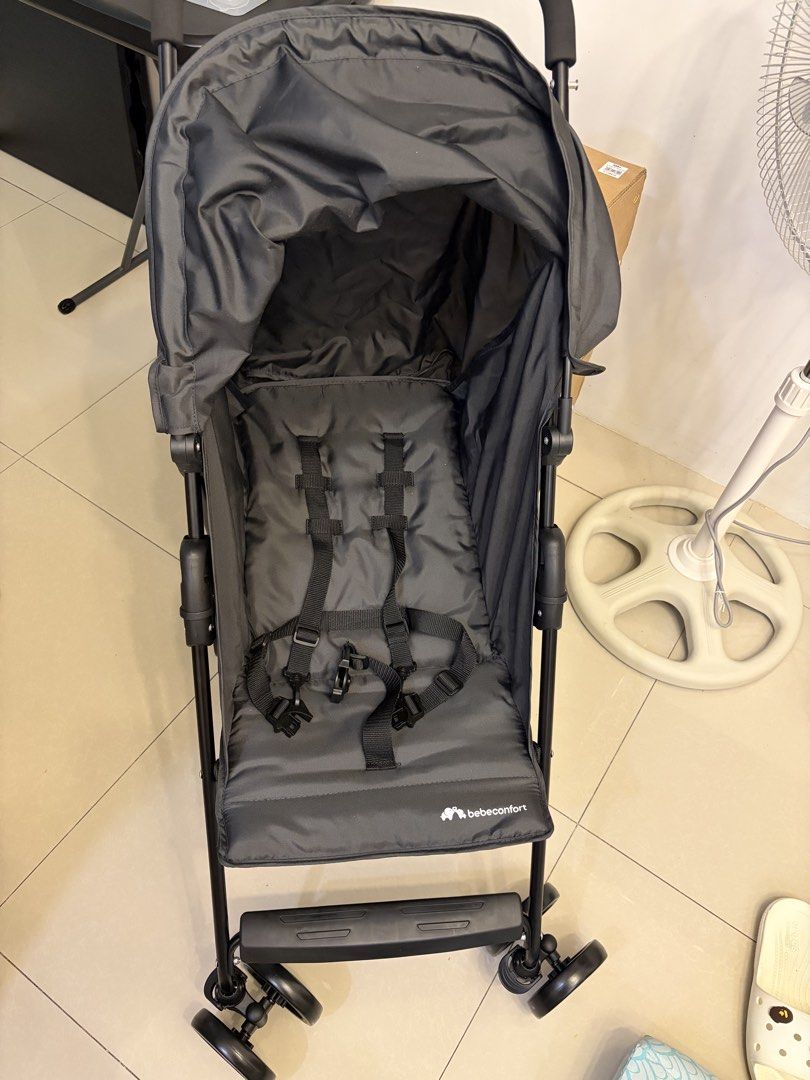 Bebeconfort Lightweight Stroller (Category: Strollers) located in Quezon City. Submitted by 123james (Listing ID 1463460745, Image 2). Description: - Lightweight black Bebeconfort stroller - Easy to fold for travel - Secure 5-point harness - Provides shade with canopy - Smooth wheels for easy maneuvering - Compact when folded, ideal for on-the-go parents Message me if interested.