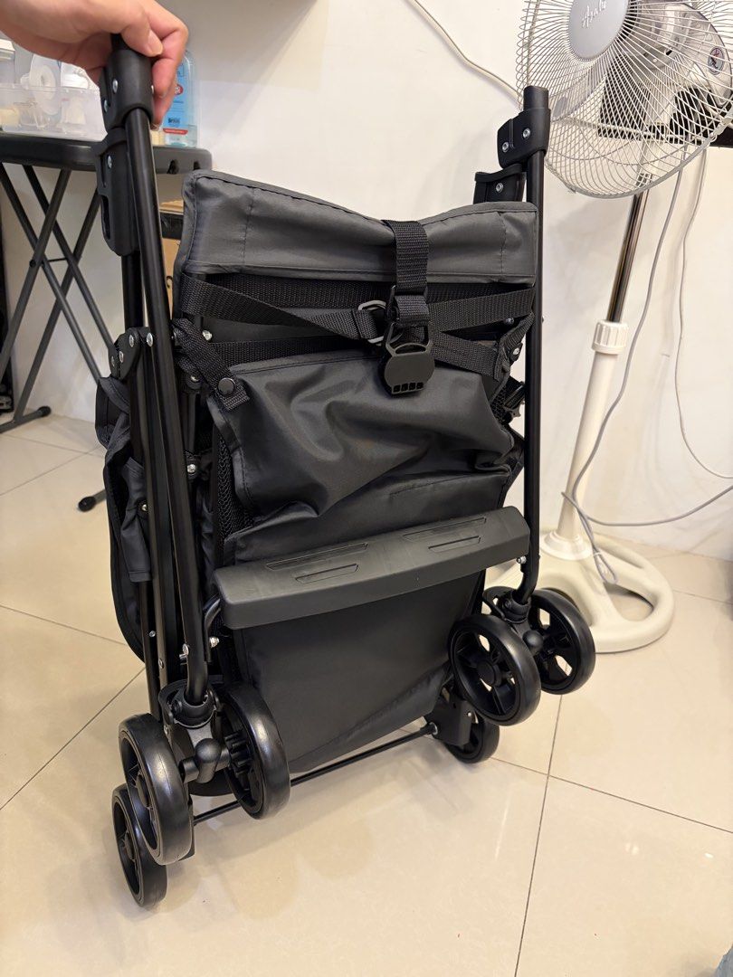 Bebeconfort Lightweight Stroller (Category: Strollers) located in Quezon City. Submitted by 123james (Listing ID 1463460745, Image 3). Description: - Lightweight black Bebeconfort stroller - Easy to fold for travel - Secure 5-point harness - Provides shade with canopy - Smooth wheels for easy maneuvering - Compact when folded, ideal for on-the-go parents Message me if interested.