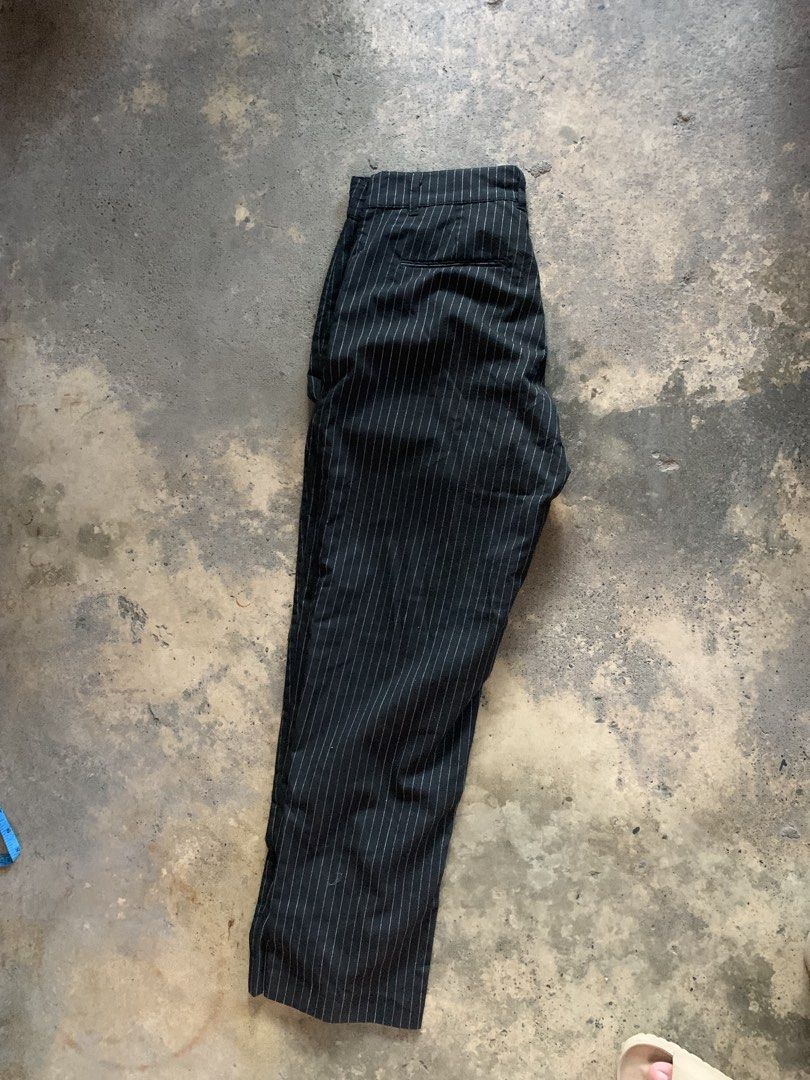 Bench Pinstripe Pants (Category: Jeans) located in Manila. Submitted by thriftnivee (Listing ID 1463432840, Image 2). Description: - Brand: Bench - Color: Black with pinstripe pattern - Fit: Classic straight leg - Closure: Button and zip front - Pockets: Two side pockets - Style: Perfect for casual or smart casual outfits - Versatility: Easily pairs with various tops.