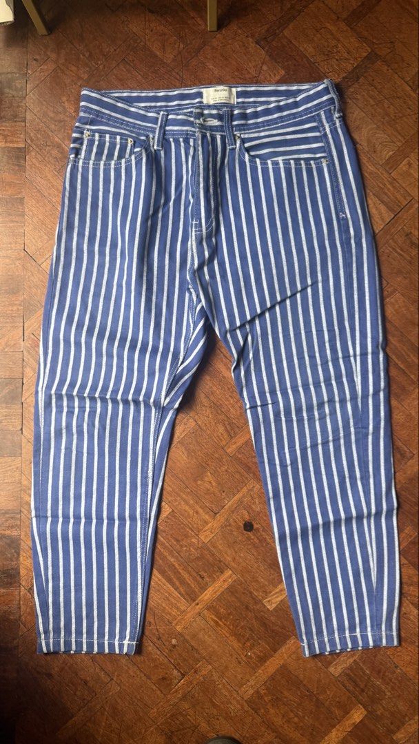 Bershka Blue White Striped Denim Jeans (Category: Trousers) located in Paranaque City. Submitted by mjohansson (Listing ID 1463371665, Image 1). Description: - Bershka Denim Pinstripe Panrs - Purchased for 2,000 - Size M (Size 31 but fits Size 29/30) - No stains or damages - Get all my listings selling for 3,500 total (9 items) for 2,000 if all purchased together - Lalamove from Makati or Parañaque City or Meetup Greenbelt Makati.