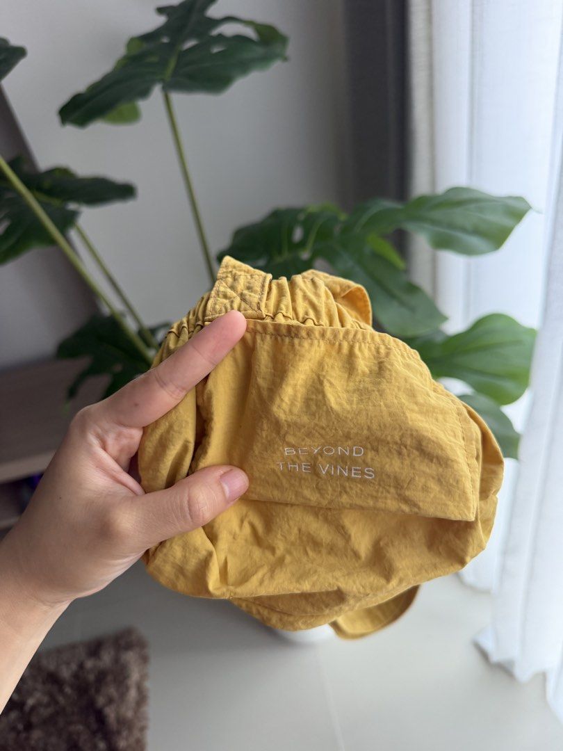 Beyond The Vines Micro Dumpling Bag (Category: Tote Bags) located in Paranaque City. Submitted by declutterwithrs (Listing ID 1463551369, Image 3). Description: - Brand: Beyond The Vines - Color: Yellow.