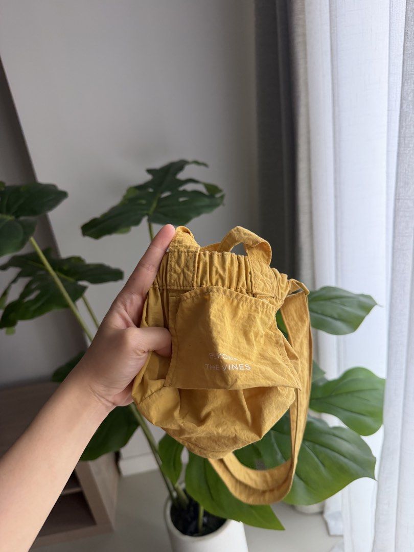 Beyond The Vines Micro Dumpling Bag (Category: Tote Bags) located in Paranaque City. Submitted by declutterwithrs (Listing ID 1463551369, Image 2). Description: - Brand: Beyond The Vines - Color: Yellow.