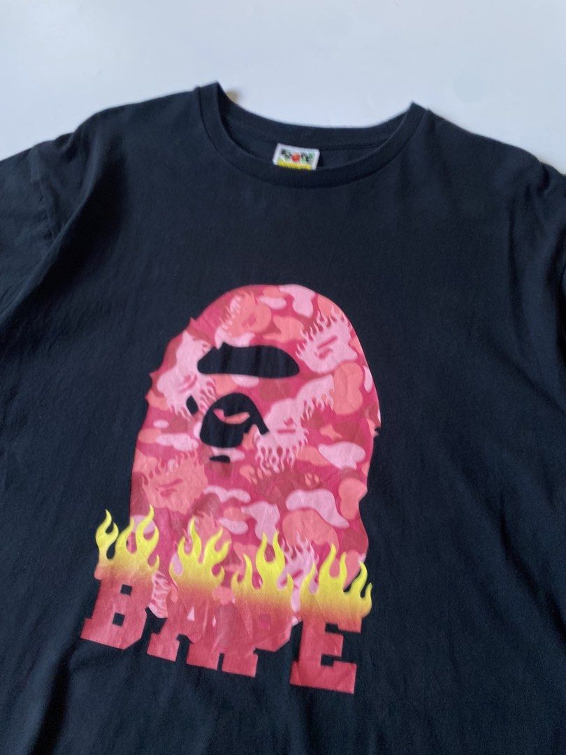 Big Head Pink Fire Camou Tee (Category: Coats, Jackets and Outerwear) located in Baguio. Submitted by archival.store (Listing ID 1463473427, Image 2). Description: BAPE Big Head Pink Fire Camou Tee Size tagged:2XL Issue:none excellent condi Width:25 Length:30.7 Shoulder:22.4 Sleeve:9.4.