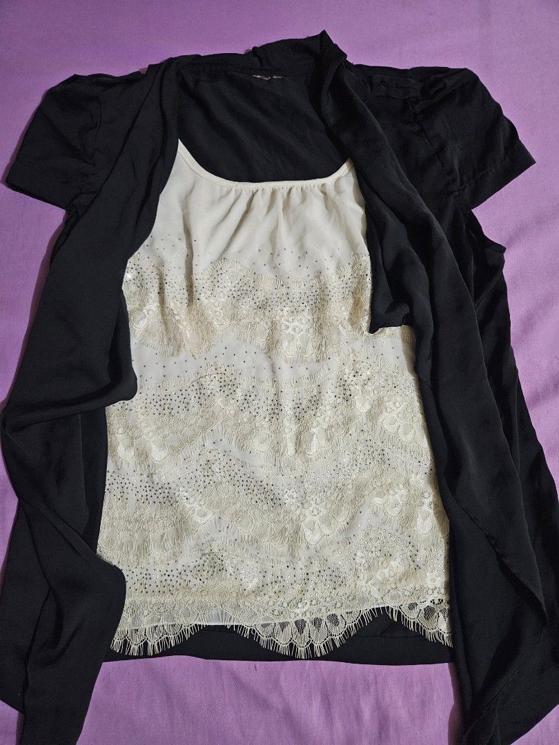 Black Draped Cardigan with Inner Boho Top Blouse (Category: Blouses) located in Taguig. Submitted by lunabelle.thrifts (Listing ID 1463490927, Image 2). Description: ୨୧ good condition, no issues ୨୧ size: large ୨୧ black draped top with a built-in boho-inspired white inner featuring layered floral lace & dainty rhinestone details ♡ ୨୧ already washed & ready to wear ♡ model’s measurements: ୨୧ bust — 40" ୨୧ underbust — 35" ୨୧ waist — 34" ୨୧ height — 