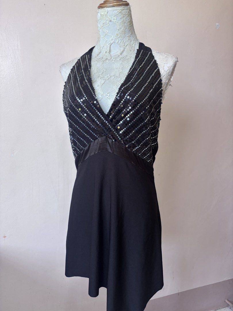 Black Halter Sequin Party Dress Mina (Category: Evening dresses & gowns) located in Manila. Submitted by galitsabarat (Listing ID 1463551268, Image 1). Description: S to semi large - Black halter neck dress - Sequin detailing on the bodice - Ties at the back for adjustable fit - Flowy A-line skirt - Ideal for parties and nights out - Brand: Mina.