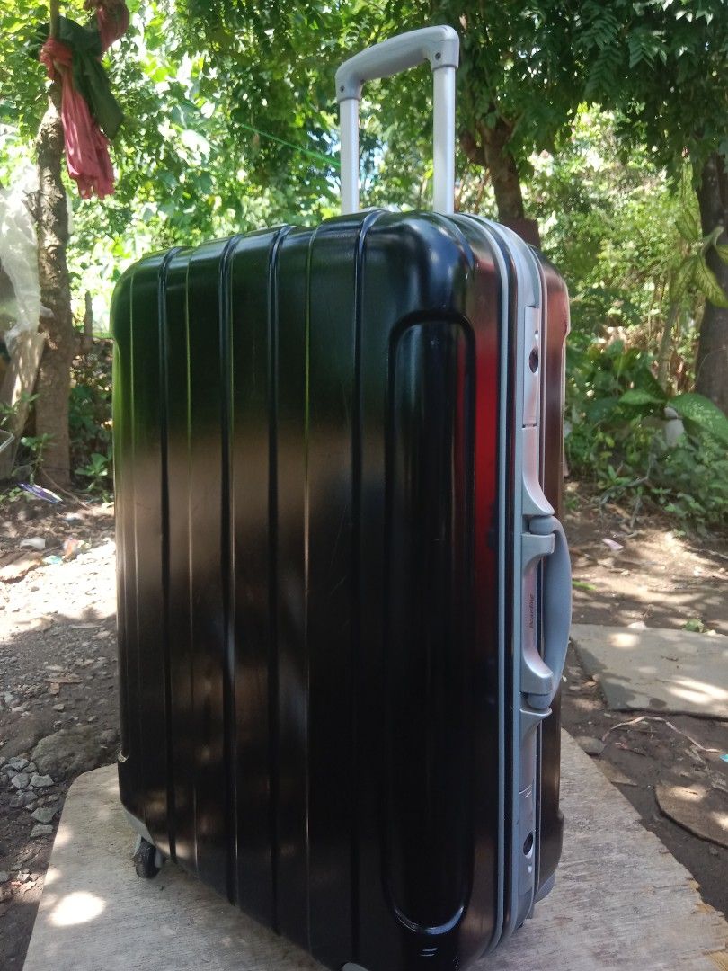 Black Hardshell Luggage (Category: Luggage) located in Muntinlupa City. Submitted by surplus.faithenasha.2930 (Listing ID 1463356983, Image 1). Description: - Sleek black hard shell rolling suitcase - Extendable handle for effortless maneuvering - Interior straps to keep your belongings secure - Smooth-gliding wheels for easy transport - Perfect for all your travel needs - Boarding Brand - Authentic from Japan we ship nationwide price is negotiab