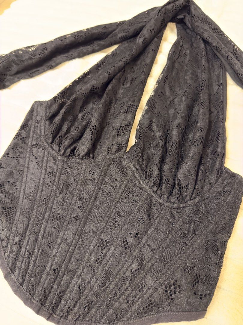 Black Lace Halter Corset Top (Category: Sleeveless) located in Rizal. Submitted by rianaht (Listing ID 1463399827, Image 3). Description: Elegant black lace halter top - Medium to Large - Never used with tag - Corset-style bodice for a flattering fit - Adjustable tie straps at the neck and back - Beautiful floral lace pattern - Convenient side zipper closure 🌸 RFS: Decluttering 🌸 Delivery only to be shouldered by the buyer. 🌸 Payment via GCash
