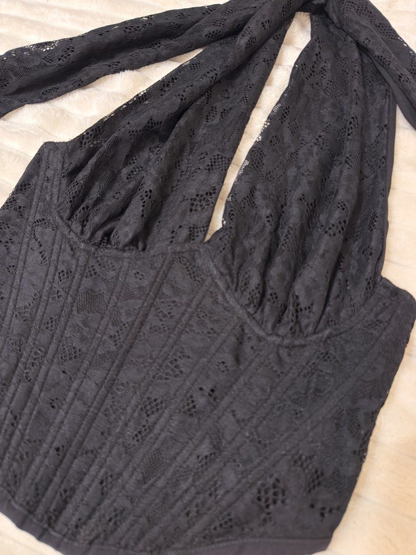 Black Lace Halter Corset Top (Category: Sleeveless) located in Rizal. Submitted by rianaht (Listing ID 1463399827, Image 2). Description: Elegant black lace halter top - Medium to Large - Never used with tag - Corset-style bodice for a flattering fit - Adjustable tie straps at the neck and back - Beautiful floral lace pattern - Convenient side zipper closure 🌸 RFS: Decluttering 🌸 Delivery only to be shouldered by the buyer. 🌸 Payment via GCash