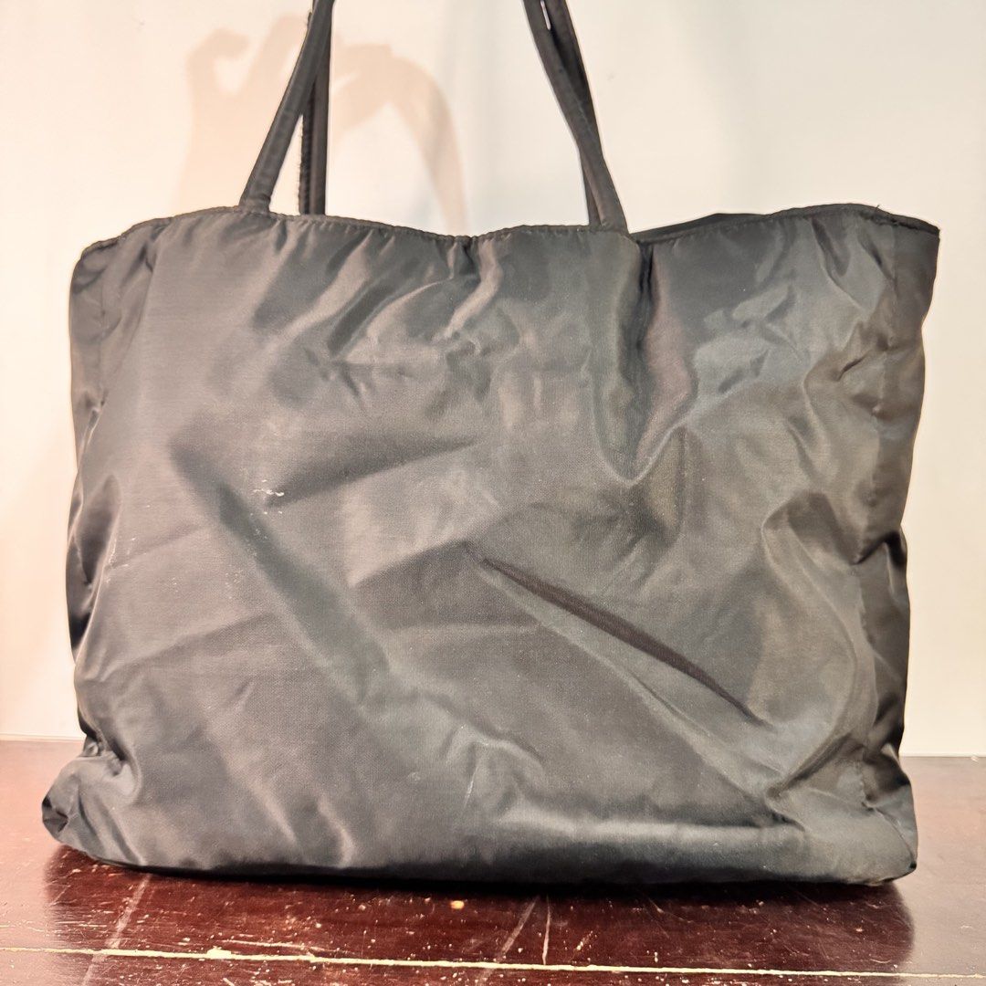 Black Nylon Tote Bag with Multiple Pockets (Category: Tote Bags) located in Bulacan. Submitted by orangepixiestixgirl (Listing ID 1463469944, Image 2). Description: ‼️message me on ig, @orangepixiestixgirl for inquiries and transactions‼️ ‼️CAN’T REPLY HERE‼️ Stylish Black Nylon Tote Bag Dimensions: Height—28cm Width— 40cm Notes: Secondhand bags from Japan surplus. Please manage your expectations, may have signs of use and minor imperfections. Ph