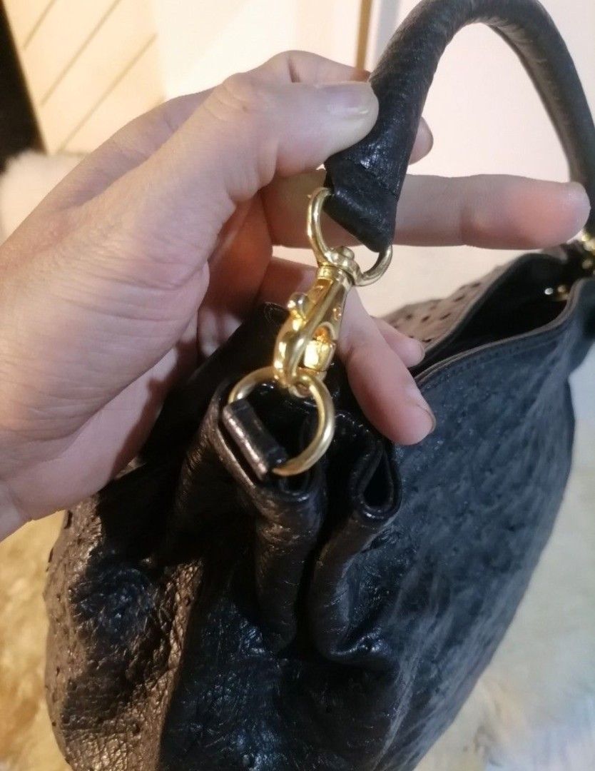 Black Ostrich Leather Shoulder Bag with Detachable Strap (Category: Shoulder Bags) located in Legazpi City. Submitted by fhlorms (Listing ID 1463429403, Image 3). Description: Chic black leather shoulder bag with a unique ostrich texture. Features a main compartment, two top handles, and a detachable crossbody strap. Accented with gold hardware. Perfect for day or night..