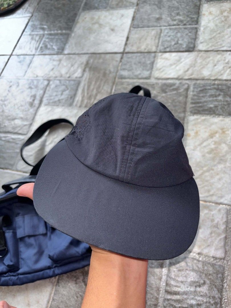 Black Performance Cap with Perforated Sides (Category: Caps & Hats) located in Iriga City. Submitted by thrifttobicol29 (Listing ID 1463452789, Image 1). Description: - Black cap with perforated sides for enhanced breathability - Made from lightweight material for comfort - Features an adjustable strap at the back for a customized fit - Ideal for both sports activities and everyday casual wear - Designed to be easily packed and carried, making it