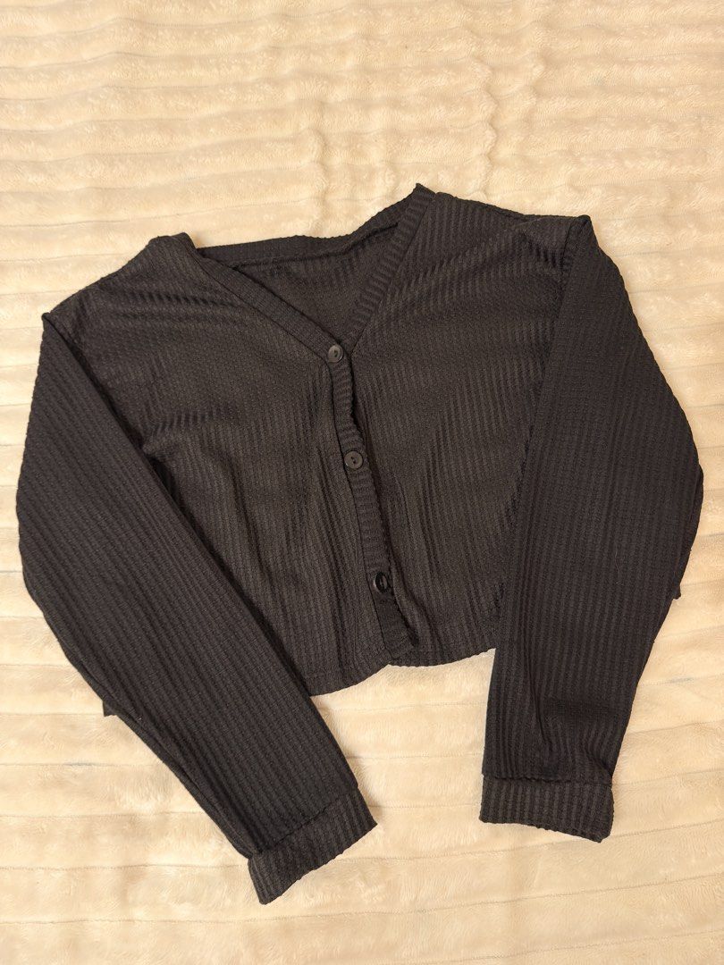 Black Ribbed Cropped Cardigan (Category: Coats, Jackets and Outerwear) located in Rizal. Submitted by rianaht (Listing ID 1463404554, Image 3). Description: Black ribbed cropped cardigan - Can fit Medium to Large 🌸 RFS: Decluttering 🌸 Delivery only to be shouldered by the buyer. 🌸 Payment via GCash / Maya / Maribank.