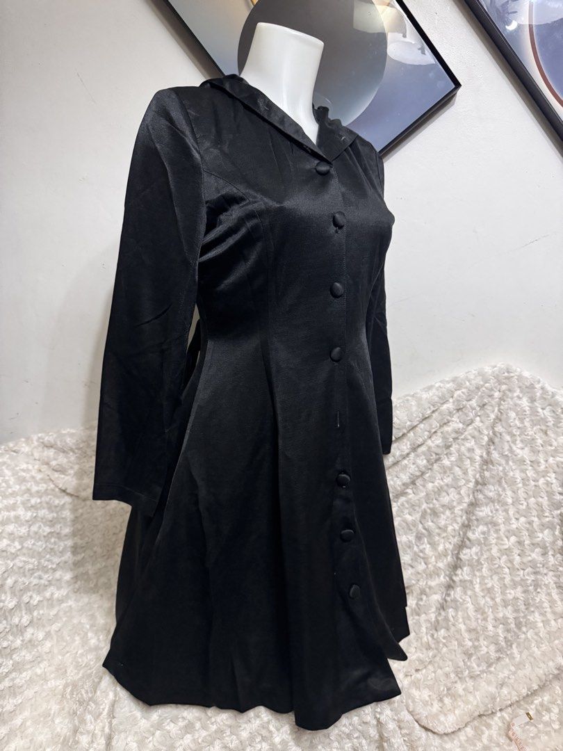 Black Satin Hooded Button-Up Dress (Category: Dresses) located in Marikina City. Submitted by lorradel (Listing ID 1463470252, Image 2). Description: - fits S-M - L: 36.5in - Elegant black satin dress with a built-in hood. - Full button-up front with matching black buttons. - Flattering fitted bodice that flares out into a skirt. - Long sleeves for a sophisticated silhouette. - Can be worn as a stylish coat dress. - Ideal for evening events or ma