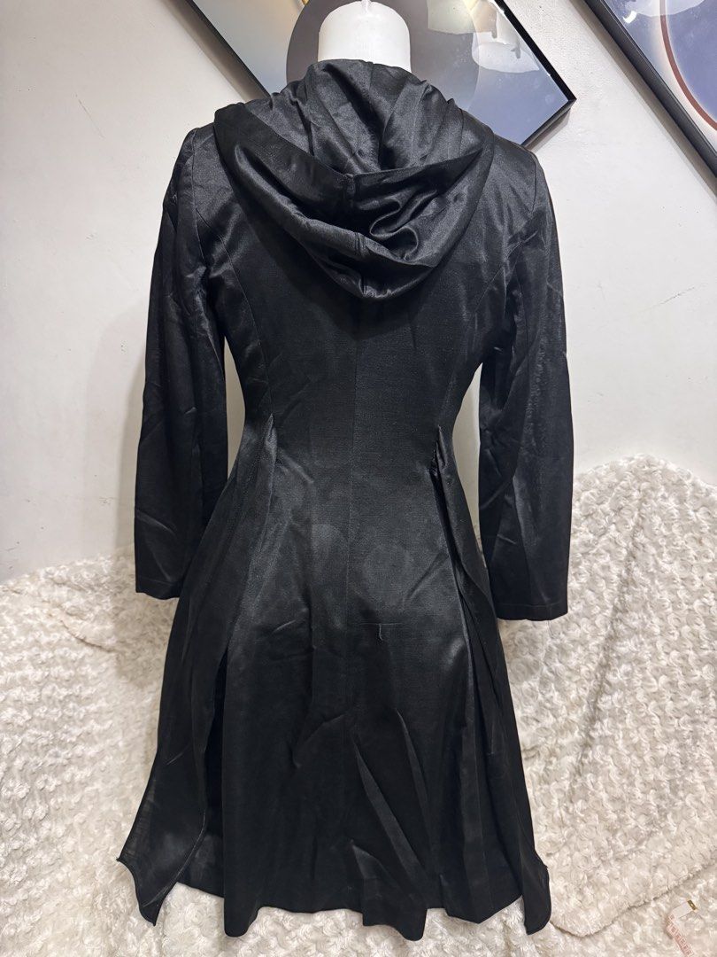 Black Satin Hooded Button-Up Dress (Category: Dresses) located in Marikina City. Submitted by lorradel (Listing ID 1463470252, Image 3). Description: - fits S-M - L: 36.5in - Elegant black satin dress with a built-in hood. - Full button-up front with matching black buttons. - Flattering fitted bodice that flares out into a skirt. - Long sleeves for a sophisticated silhouette. - Can be worn as a stylish coat dress. - Ideal for evening events or ma
