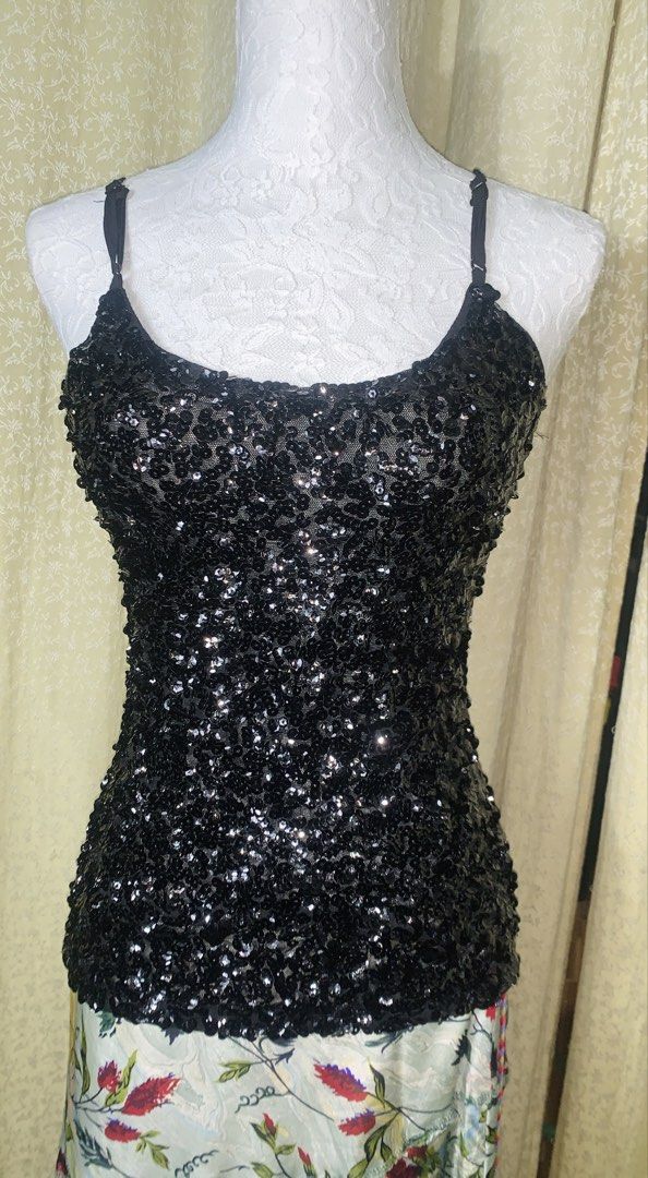 Black Sequin Spaghetti Strap Tank Top (Category: Sleeveless) located in Dagupan City. Submitted by sj_styles0910. (Listing ID 1463533080, Image 1). Description: - All-over sparkly black sequins - Thin, adjustable straps - Versatile: wear alone or layered - Perfect for parties, nights out, or special events - Adds instant glam to any outfit.