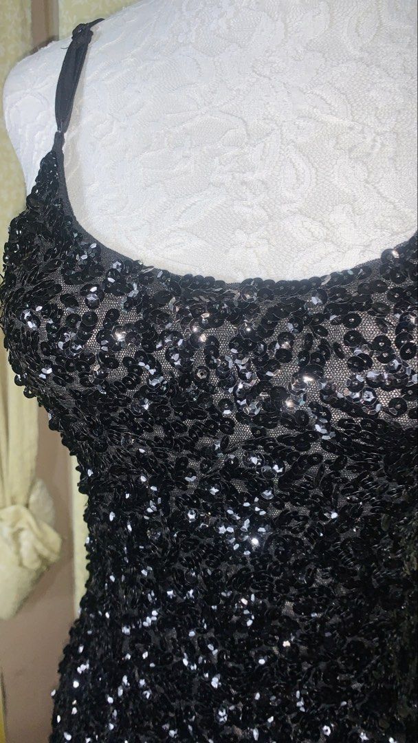 Black Sequin Spaghetti Strap Tank Top (Category: Sleeveless) located in Dagupan City. Submitted by sj_styles0910. (Listing ID 1463533080, Image 2). Description: - All-over sparkly black sequins - Thin, adjustable straps - Versatile: wear alone or layered - Perfect for parties, nights out, or special events - Adds instant glam to any outfit.