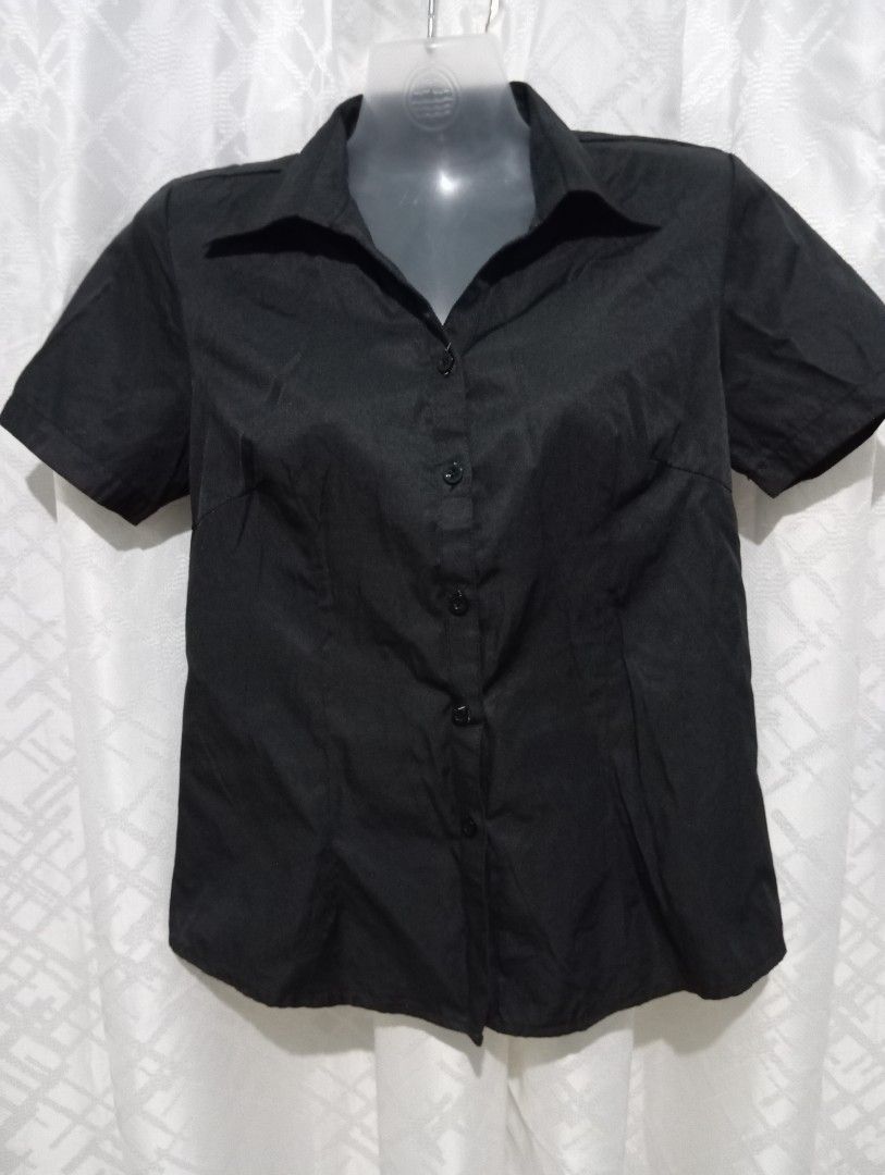 Black Short Sleeve Button-Up Shirt (Category: Shirts) located in Dasmarinas. Submitted by kei05 (Listing ID 1463451377, Image 1). Description: - Classic black short sleeve shirt - Button-up front - Simple and versatile design - Perfect for casual or smart casual outfits - Effortlessly pairs with any bottoms Large in size but fits also to Small and Medium .