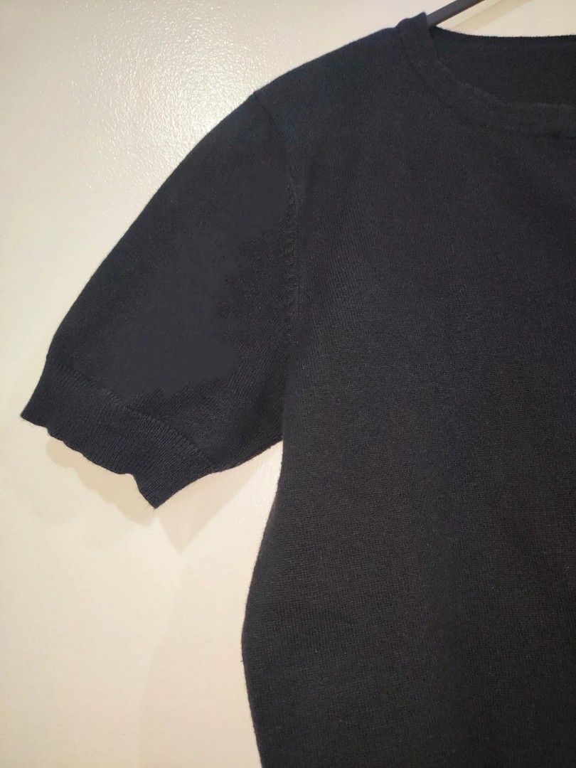 Black Short Sleeve Henley Knit Top (Category: Blouses) located in Quezon City. Submitted by maxsab (Listing ID 1463493964, Image 2). Description: - Black short sleeve knit top - Henley neckline with 3 buttons - Soft and stretchy material - Ideal for casual wear or layering - Pairs easily with jeans or skirts.