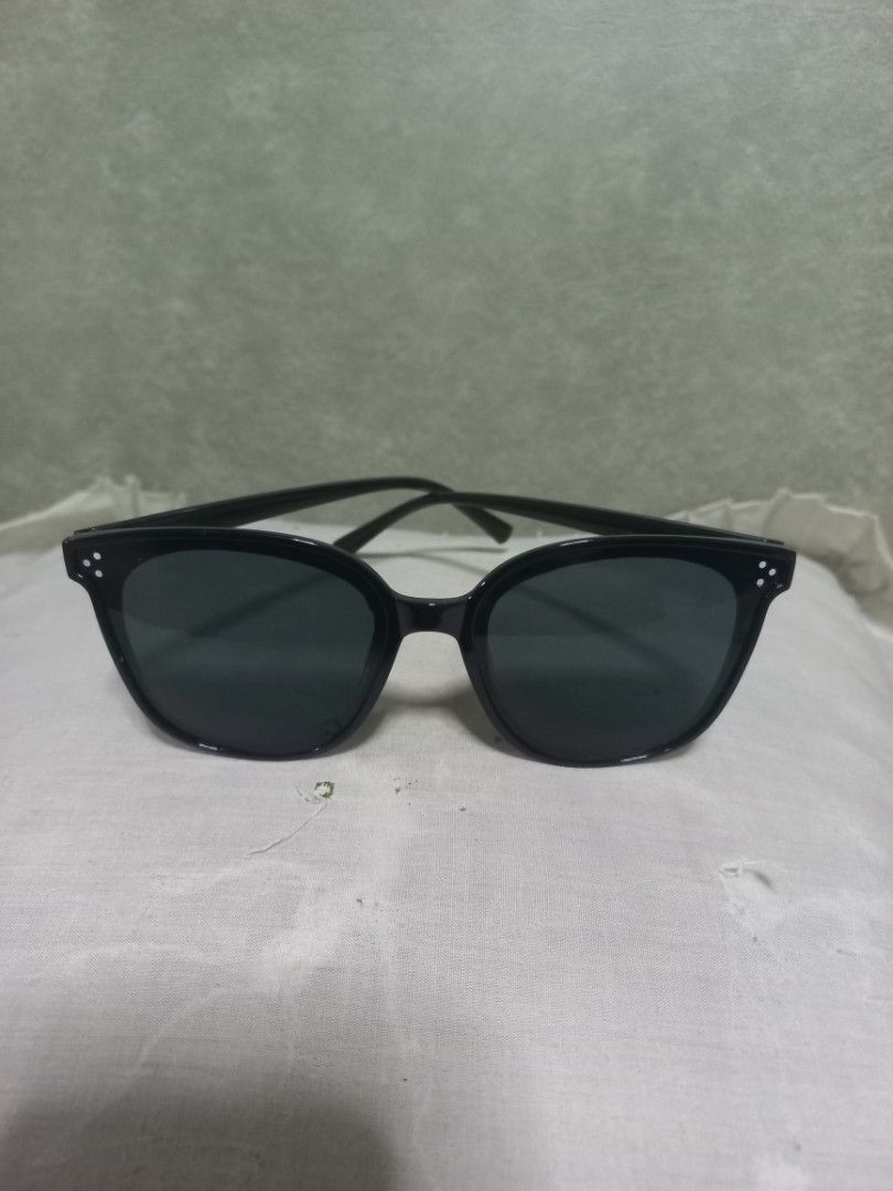 Black Square Frame Sunglasses (Category: Sunglasses & Eyewear) located in Quezon City. Submitted by msdcshop (Listing ID 1463341644, Image 2). Description: - Classic black square frames - Dark lenses for excellent sun protection - Subtle dot detail on frame corners - Stylish accessory for any outfit - Perfect for sunny days out - Offers good coverage and a great look.