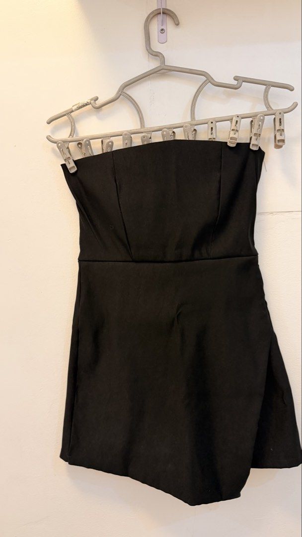 Black Tube Jumpshort (Category: Dresses) located in Angeles City. Submitted by hooni_park (Listing ID 1463482110, Image 2). Description: - Black strapless mini dress - Fitted, structured bodice - Asymmetrical hemline - Side zipper closure - Ideal for parties or a night out.